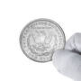 The 1878 Morgan Silver Dollar First Year of Issue Tribute, The 1878 Morgan Silver Dollar First Year of Issue Tribute 6700 0075 d coinhandshot